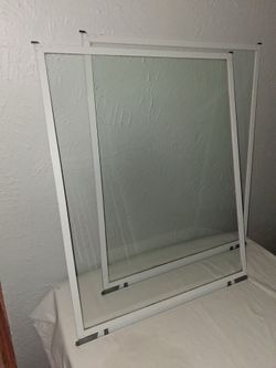 Storm door glass panels