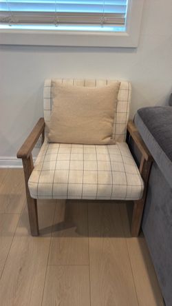 Chair with throw pillow