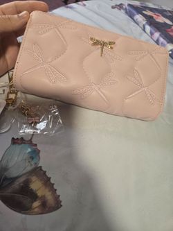 Woman pink wallet