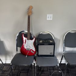 Electric Guitar With Amplifier 
