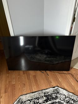 65in TLC smart Tv With Roku Remote