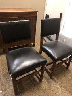 2 leather chairs. Antique chairs. $80 each