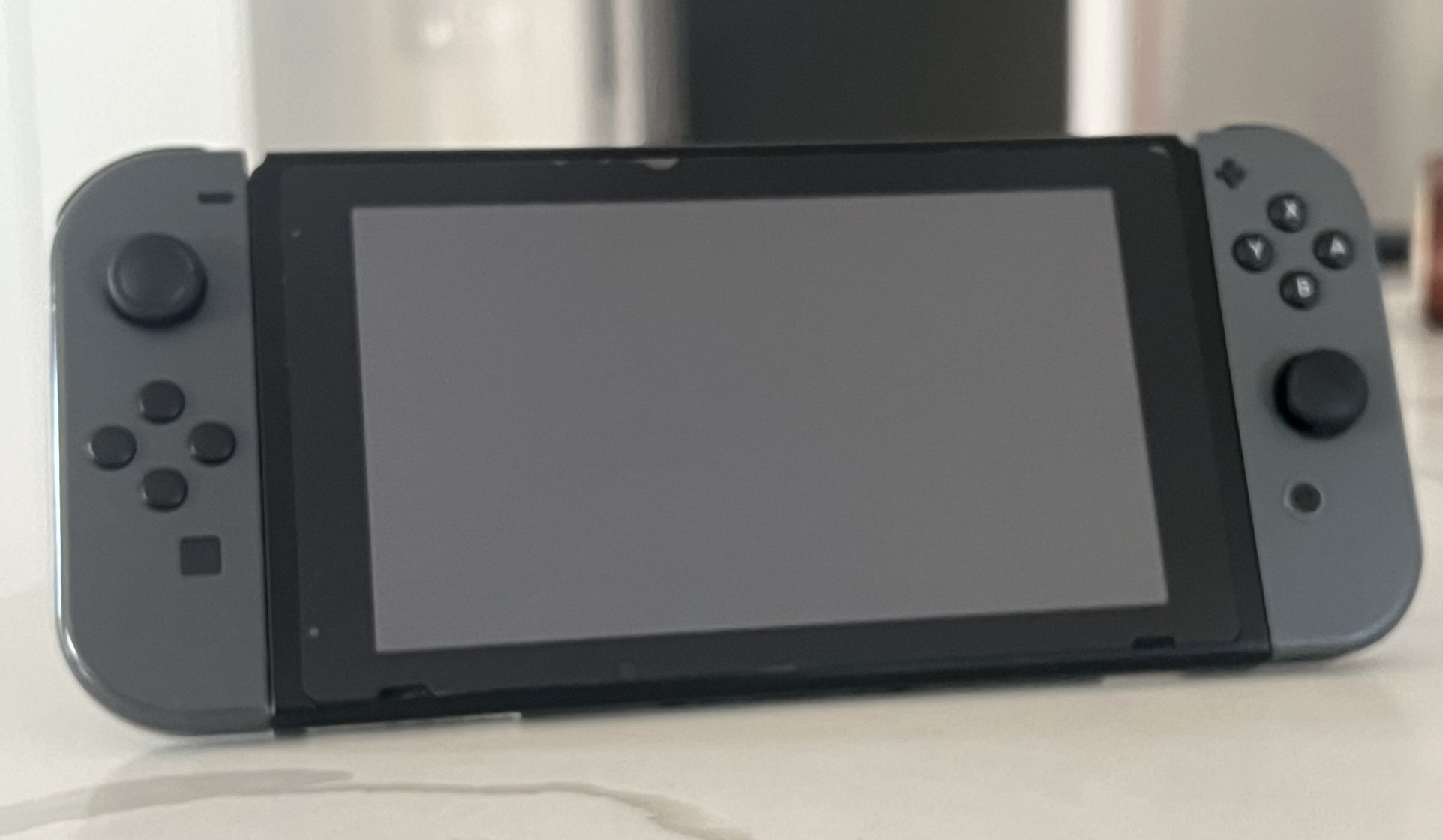 Nintendo Switch + 3 games