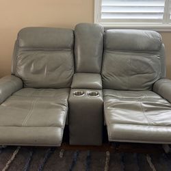 Harvey’s leather power recliner loveseat