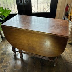 Antique maple gate-leg table.