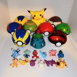 lot of Pokemon toys... multiple Pokemon balls, Fat Pikachu no tail, and  vintage 90s Squirting Bulbasaur