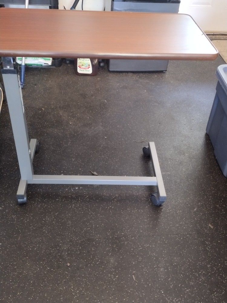 Adjustable over bed table