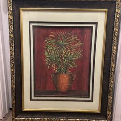  framed painting depicting a potted plant.