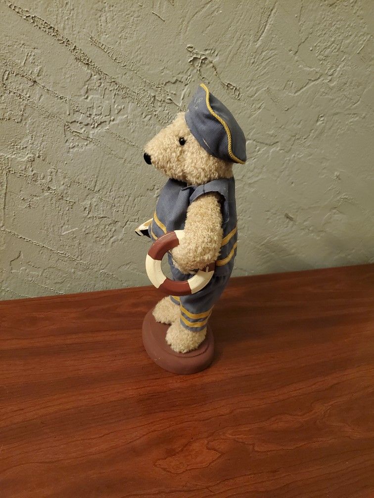Nautical Bear Holding A Boat And Life Saver Floater