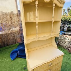 Vintage shelving unit with storage drawers