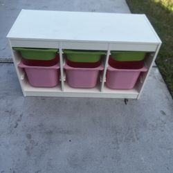 IKEAs Family TROFAST Frame, white  Used in good condition with some cosmetic blemishes. These blemishes are in the form of scratches and scuff marks a