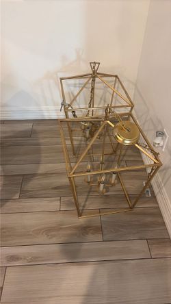 Two gold pendant lights