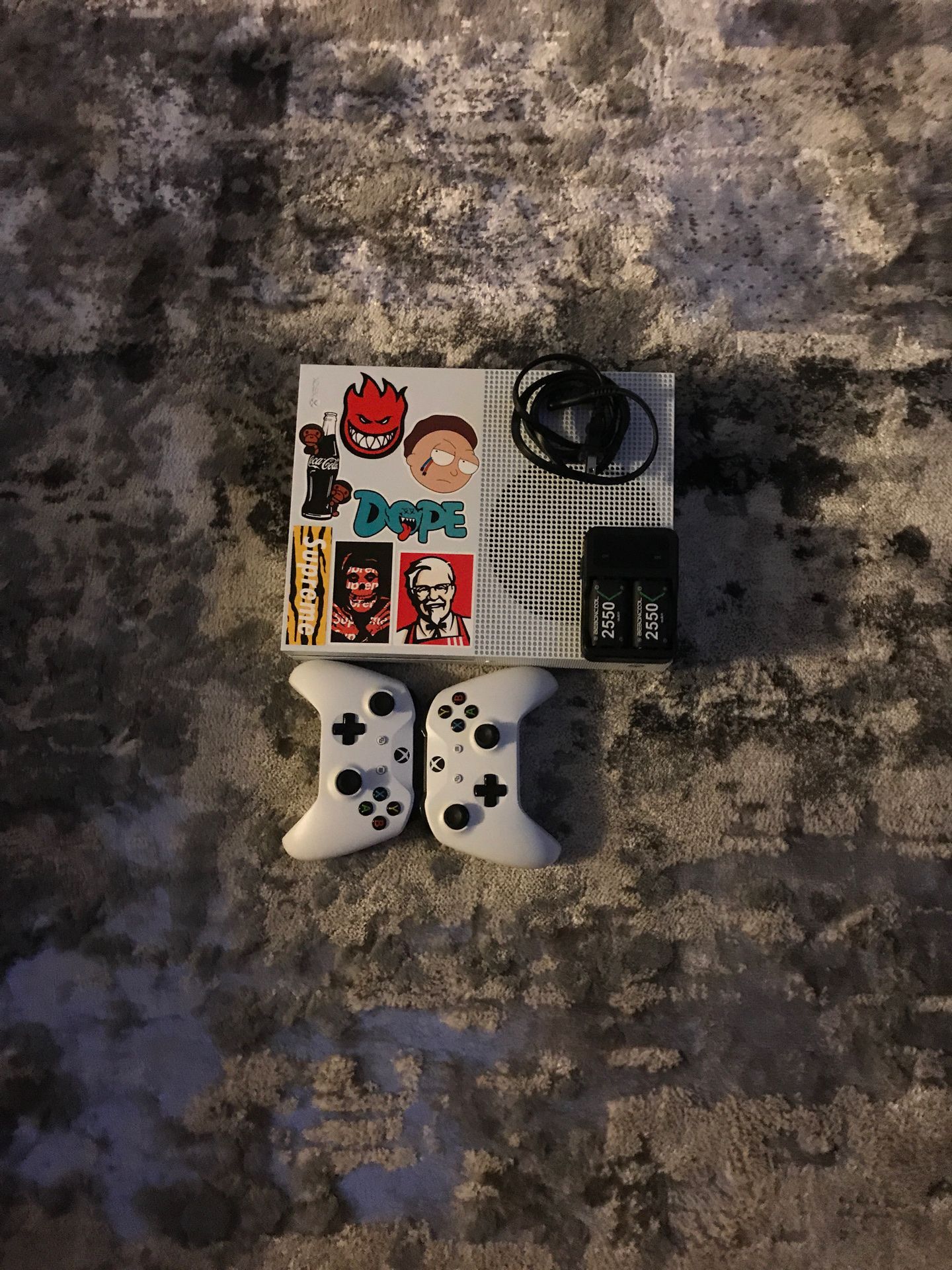 Xbox 1s with 2 controllers and a rechargeable battery kit