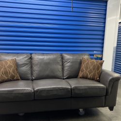 Grayish Leather Couch (free delivery)