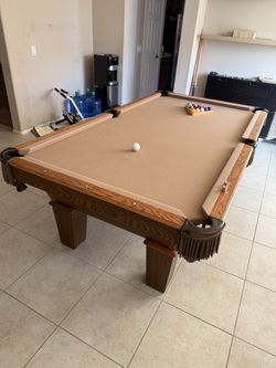 8-foot Olhausen pool table / dining table combo with 6 white linen chairs