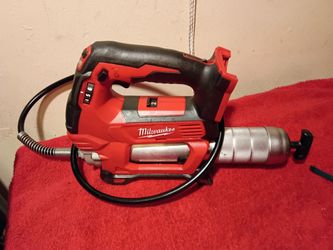 Used M18 Milwaukee grease gun tool only $180