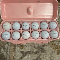 A Dozen TaylorMade Golf Balls