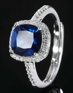 Blue Sapphire Halo Diamond Ring and Blue Sapphire tennis bracelet.
