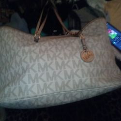 Two Purses A Michael Kors And A Coach