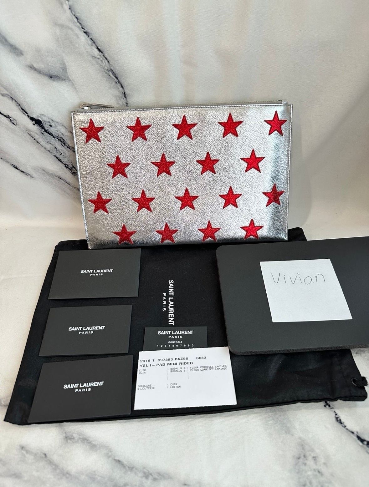 YSL Saint Laurent Paris pouch silver with red stars NWT