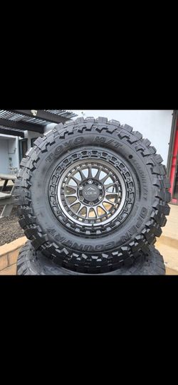 17" LOCK Mojave model rims w/ 33" Toyo MT tires all season 17x8.5 +25 offset