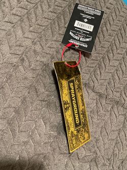 Sprayground gold tag