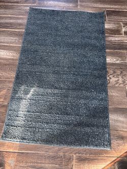 Indoor dark blue rug 34” x 20.5”