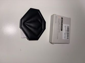 Seat belt adjuster