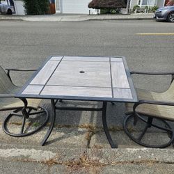 Tile Top Patio Table And 2 Swivel Chairs
