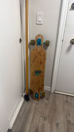 Longboard with paddle stick