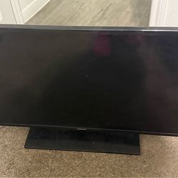 Samsung TV with remote and cable