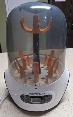 Baby brezza bottle 🍼  sterilizer with free toys (included)