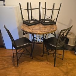 Great Condition Table And Chairs
