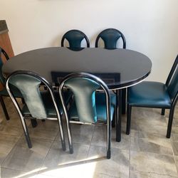 Black Formica Dining Table With 6 Metal Chairs. Pick Upon Pasadena. 