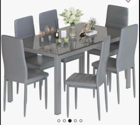 Nadeane 7 - Piece Dining Set with Faux Leather Upholstered Dining Chairs!