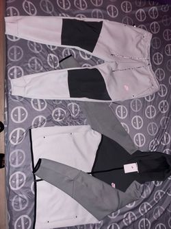 Nike tech jumpsuit (size L)