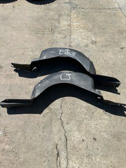 Jeep Wrangler LJ rear inner fender flares Oem pair 2004 through 2006
