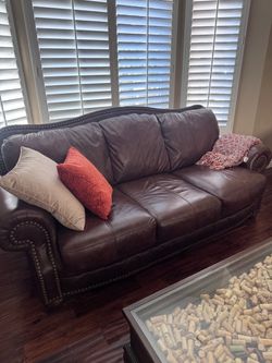 3 seat brown sofa