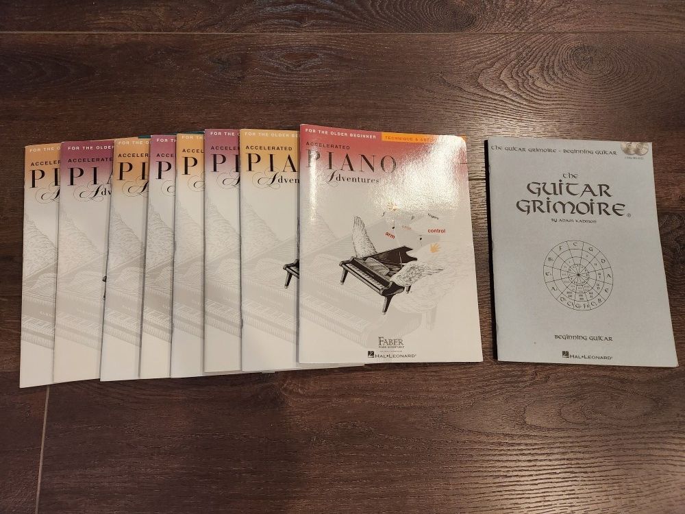 Self Teaching Piano, Guitar Lesson Books 8 piano nooks and 1 Guitar book with 2 DVDs, Great Condition