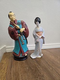 Pair Of Ceramic Figurines.  Samurai & Geisha.