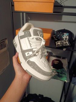 Grey and white lv trainers