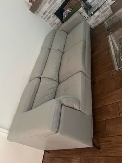 Grey Couch - By Sofia Vergara
