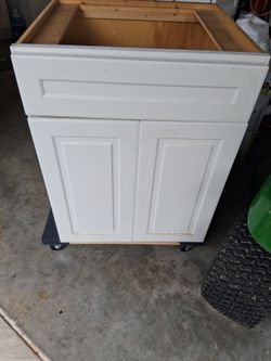 Bathroom vanity , all wood cabinets both for 125.00