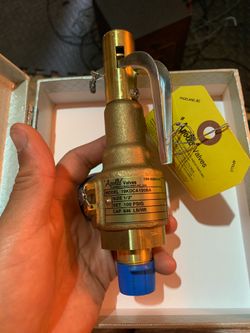 New Apollo Safety Relief Valve, Model 19KDCA100BA. Brand new, never installed, and comes with the original tag and protective cap.