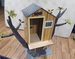 American Girl Tree House  Kit's Tree House Doll House, no fence on porch Very good condition except few corners due to age of it just missing hanging