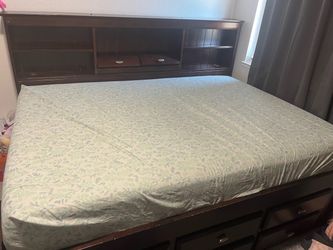 Need gone Asap. Full size captain bed lots of storage