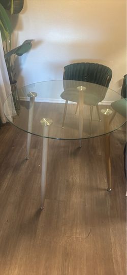 Glass dinning table with wood legs