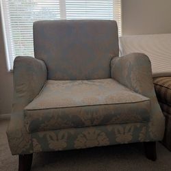 Large Blue Chair With Patterns