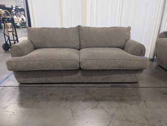 Textured Tan Fabric Two-Cushion Couch with Rolled Arms