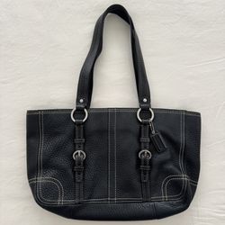 Black Coach leather buckle handbag with silver hardware